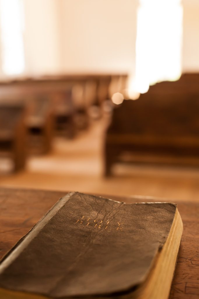 Bible A Bible lying on the pulpit in a church. Cades Cove Great Smoky Mountains National Park TN USA.
** Note: Shallow depth of field